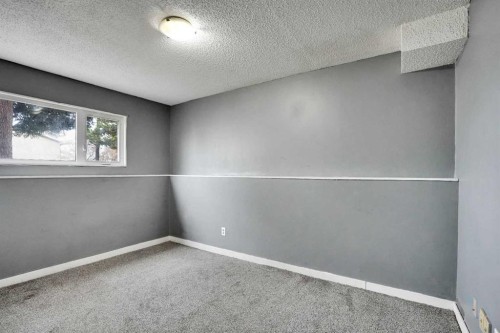 52 Pennsburg Way Se, Calgary, AB - Indoor Photo Showing Other Room