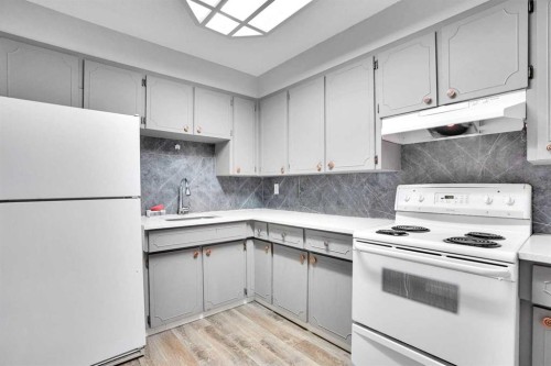 52 Pennsburg Way Se, Calgary, AB - Indoor Photo Showing Kitchen