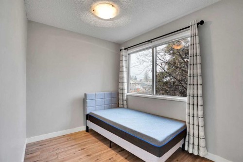 52 Pennsburg Way Se, Calgary, AB - Indoor Photo Showing Bedroom