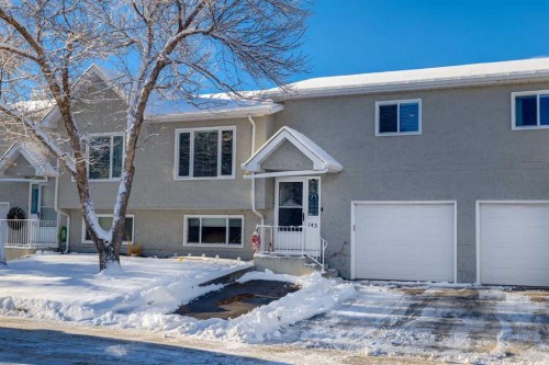 145 Fairway View Nw, High River, AB - Outdoor With Facade