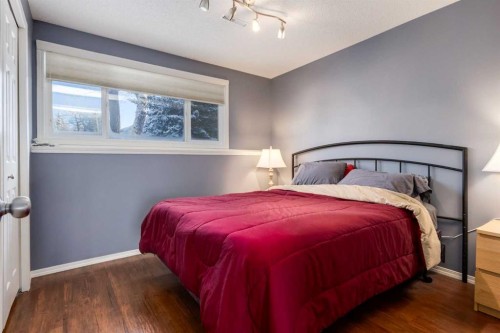 145 Fairway View Nw, High River, AB - Indoor Photo Showing Bedroom