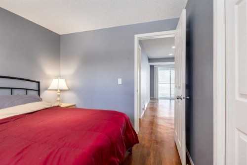 145 Fairway View Nw, High River, AB - Indoor Photo Showing Bedroom