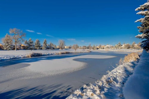 145 Fairway View Nw, High River, AB - Outdoor With Body Of Water With View