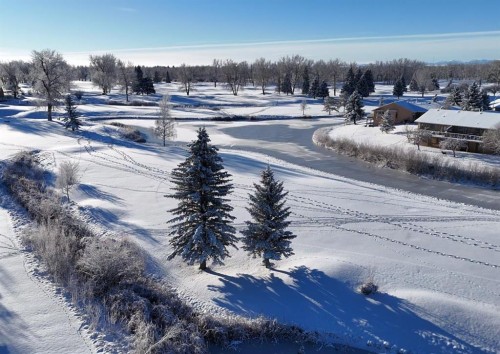 145 Fairway View Nw, High River, AB - Outdoor With View