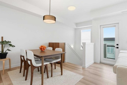 162 Spring Creek Common Sw, Calgary, AB - Indoor Photo Showing Dining Room