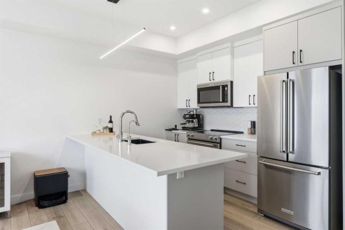 162 Spring Creek Common Sw, Calgary, AB - Indoor Photo Showing Kitchen With Upgraded Kitchen