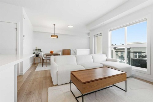162 Spring Creek Common Sw, Calgary, AB - Indoor Photo Showing Living Room