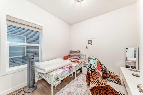 10 Homestead Passage Ne, Calgary, AB - Indoor Photo Showing Bedroom