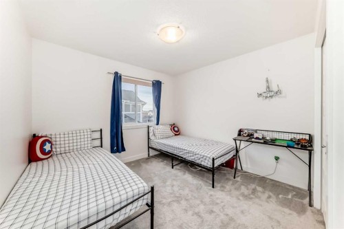 10 Homestead Passage Ne, Calgary, AB - Indoor Photo Showing Bedroom