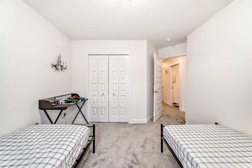 10 Homestead Passage Ne, Calgary, AB - Indoor Photo Showing Bedroom