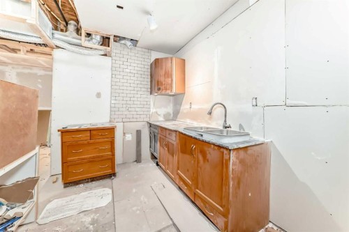 10 Homestead Passage Ne, Calgary, AB - Indoor Photo Showing Kitchen With Double Sink