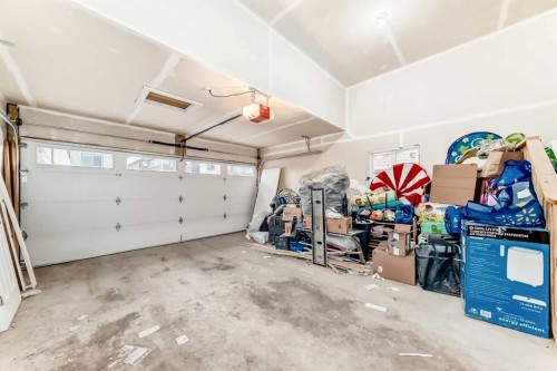 10 Homestead Passage Ne, Calgary, AB - Indoor Photo Showing Garage