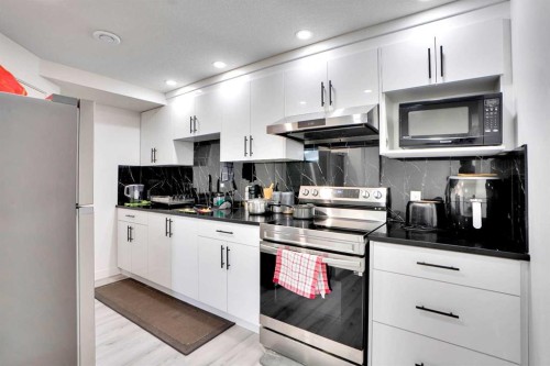 32 Redstone Court Ne, Calgary, AB - Indoor Photo Showing Kitchen