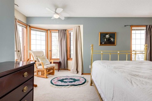 48 Patina Point Sw, Calgary, AB - Indoor Photo Showing Bedroom