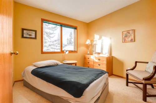 48 Patina Point Sw, Calgary, AB - Indoor Photo Showing Bedroom