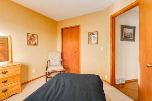 48 Patina Point Sw, Calgary, AB - Indoor Photo Showing Bedroom