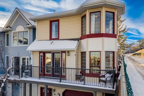 48 Patina Point Sw, Calgary, AB - Outdoor With Deck Patio Veranda With Facade