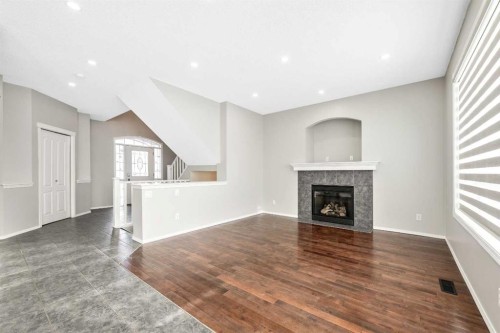 312 Kincora Heights Nw, Calgary, AB - Indoor Photo Showing Living Room With Fireplace