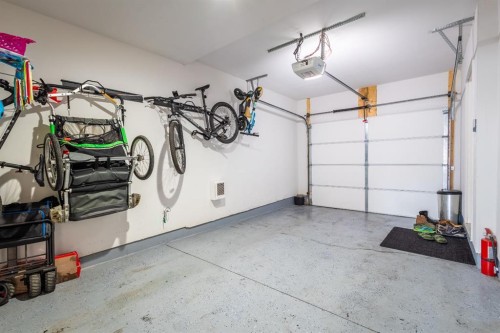 137 Les Jardins Park Se, Calgary, AB - Indoor Photo Showing Garage
