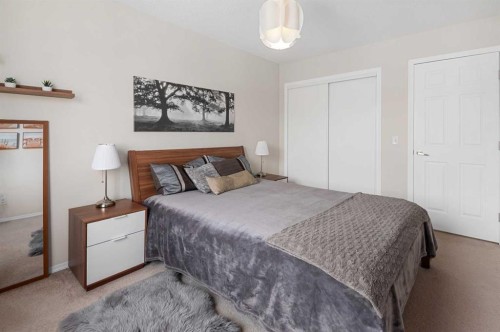 19 Windstone Green Sw, Airdrie, AB - Indoor Photo Showing Bedroom