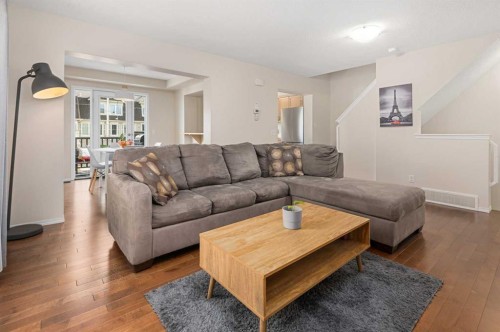 19 Windstone Green Sw, Airdrie, AB - Indoor Photo Showing Living Room
