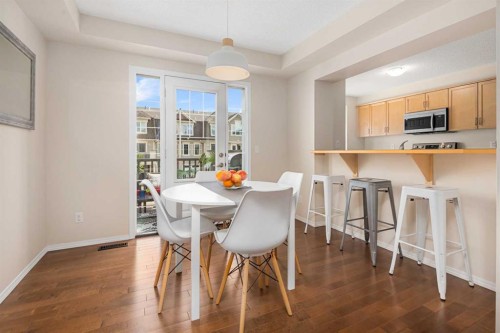 19 Windstone Green Sw, Airdrie, AB - Indoor Photo Showing Dining Room