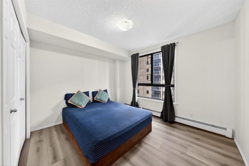 1107-1111 6 Avenue Sw, Calgary, AB - Indoor Photo Showing Bedroom