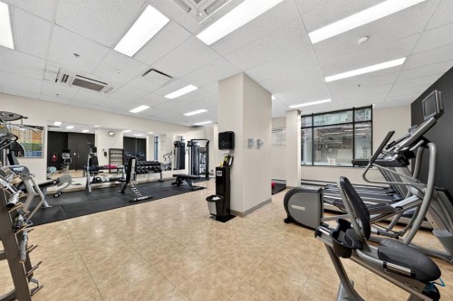 1107-1111 6 Avenue Sw, Calgary, AB - Indoor Photo Showing Gym Room