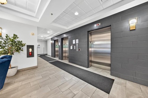 1107-1111 6 Avenue Sw, Calgary, AB - Indoor Photo Showing Other Room