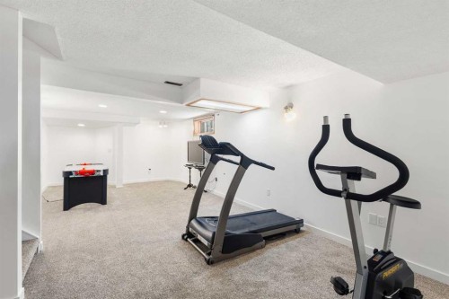 70 Pasadena Gardens Ne, Calgary, AB - Indoor Photo Showing Gym Room