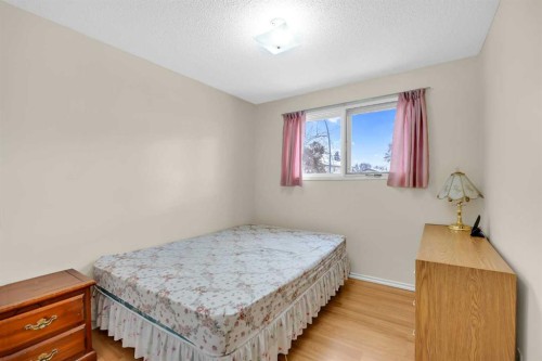 12 Whitaker Close Ne, Calgary, AB - Indoor Photo Showing Bedroom