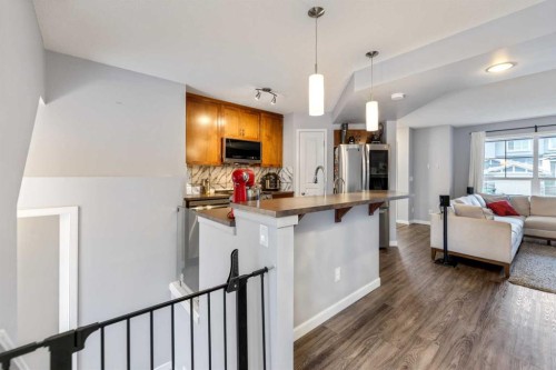 243 New Brighton Landing Se, Calgary, AB - Indoor Photo Showing Kitchen
