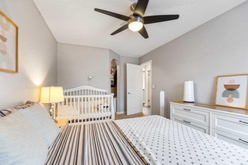 243 New Brighton Landing Se, Calgary, AB - Indoor Photo Showing Bedroom