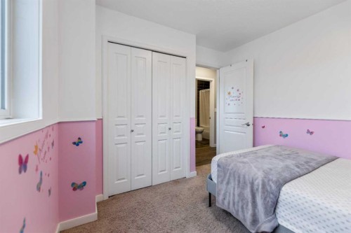 243 New Brighton Landing Se, Calgary, AB - Indoor Photo Showing Bedroom