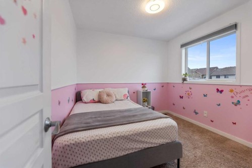243 New Brighton Landing Se, Calgary, AB - Indoor Photo Showing Bedroom