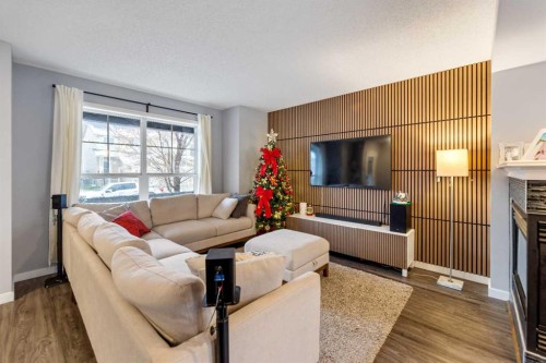 243 New Brighton Landing Se, Calgary, AB - Indoor Photo Showing Living Room