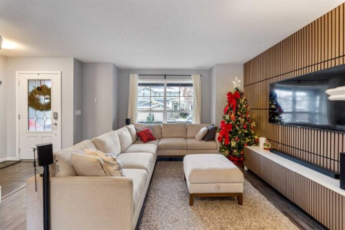 243 New Brighton Landing Se, Calgary, AB - Indoor Photo Showing Living Room