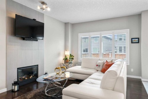 236 Walden Heights Se, Calgary, AB - Indoor Photo Showing Living Room With Fireplace