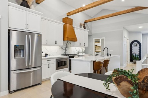 376 Precedence Hill, Cochrane, AB - Indoor Photo Showing Kitchen With Upgraded Kitchen