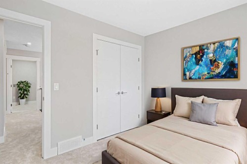 60 Bridges Drive, Langdon, AB - Indoor Photo Showing Bedroom