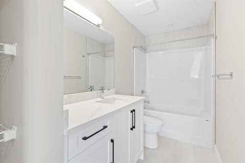 60 Bridges Drive, Langdon, AB - Indoor Photo Showing Bathroom