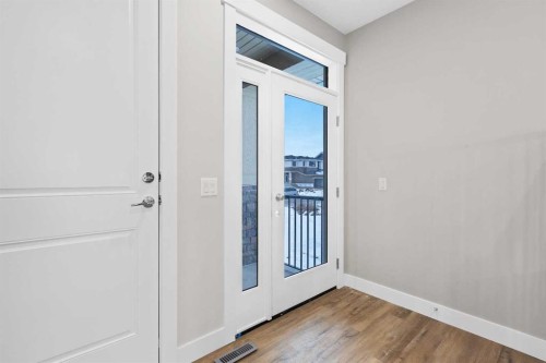 60 Bridges Drive, Langdon, AB - Indoor Photo Showing Other Room