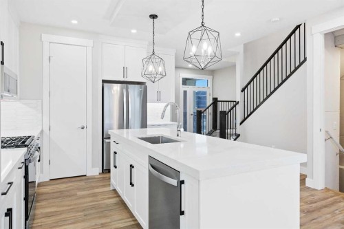 60 Bridges Drive, Langdon, AB - Indoor Photo Showing Kitchen With Upgraded Kitchen