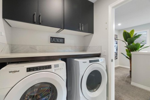 306 Corner Meadows Way Ne, Calgary, AB - Indoor Photo Showing Laundry Room