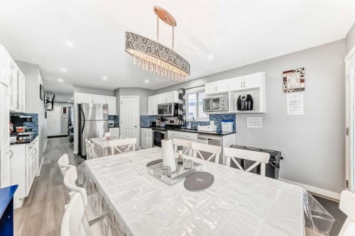 240 Applewood Drive Se, Calgary, AB - Indoor Photo Showing Dining Room