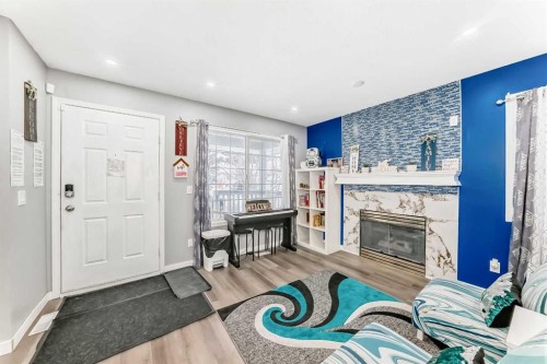 240 Applewood Drive Se, Calgary, AB - Indoor With Fireplace