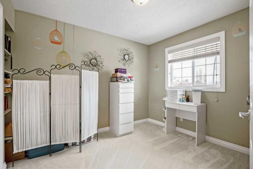 26 Simcrest Manor Sw, Calgary, AB - Indoor Photo Showing Other Room