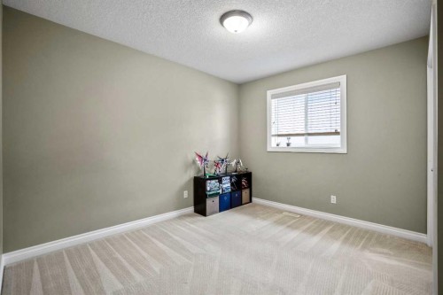 26 Simcrest Manor Sw, Calgary, AB - Indoor Photo Showing Other Room