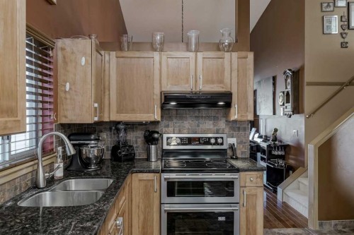 148 Citadel Close Nw, Calgary, AB - Indoor Photo Showing Kitchen With Stainless Steel Kitchen With Double Sink