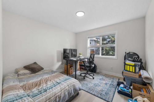 27 Cedarwood Lane Sw, Calgary, AB - Indoor Photo Showing Bedroom